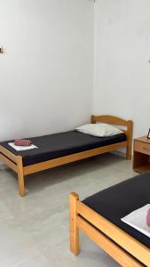 Ein Bett oder Betten in einem Zimmer der Unterkunft ADRIA