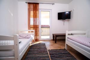 En eller flere senge i et værelse på House Amalia