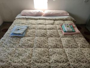 A bed or beds in a room at Il ristoro del viandante