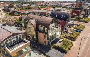an aerial view of a building in a city at Appartement Shrimp in Egmond aan Zee