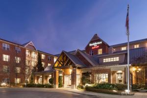 an exterior view of a hotel at night at Residence Inn by Marriott Franklin Cool Springs in Franklin