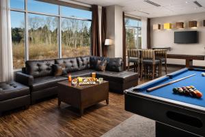 a living room with a pool table at Residence Inn Seattle Bellevue Downtown in Bellevue