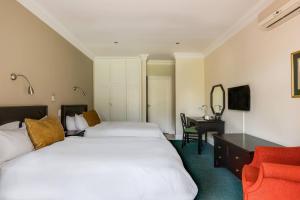 Postel nebo postele na pokoji v ubytování Protea Hotel by Marriott George King George