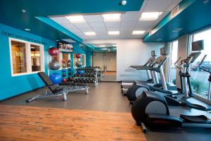 a gym with several treadmills and elliptical machines at Fairfield Inn & Suites by Marriott Detroit Lakes in Detroit Lakes