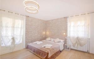 A bed or beds in a room at Villa Cristina