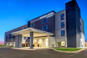 un edificio con un cartel en la parte delantera en SpringHill Suites by Marriott Amarillo, en Amarillo