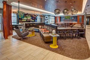 a lobby with a bar and a restaurant at SpringHill Suites by Marriott Amarillo in Amarillo