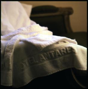 Postel nebo postele na pokoji v ubytování Hôtel Antares & Spa