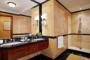 a bathroom with a large sink and a shower at The Westin Excelsior, Rome in Rome