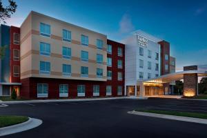 una rappresentazione di un hotel con parcheggio di Fairfield Inn & Suites by Marriott Shelby a Shelby