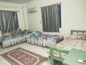 Una cama o camas en una habitación de ras sidr راس سدر اجمل شاليه جاهز كامل فى احسن مكان فى مصر جولدن بيتش1 راس سدر