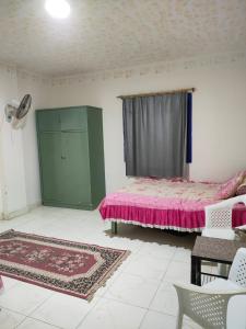 Una cama o camas en una habitación de ras sidr راس سدر اجمل شاليه جاهز كامل فى احسن مكان فى مصر جولدن بيتش1 راس سدر