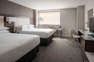 Krevet ili kreveti u jedinici u objektu Provo Marriott Hotel & Conference Center