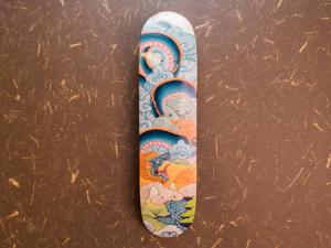 a skateboard with a painting of a dragon on it at Wakatake in Katsuura