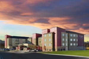 a rendering of a building with cars parked in a parking lot at Residence Inn by Marriott Denver Southwest/Littleton in Littleton