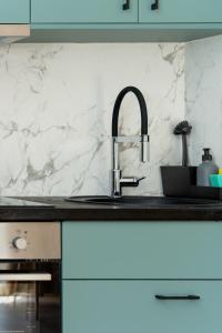 A kitchen or kitchenette at Studio 71!Charming flat in Chania