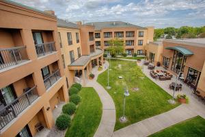 an aerial view of an apartment complex with a courtyard at Courtyard Fargo Moorhead, MN in Moorhead