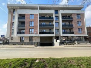 an apartment building on the corner of a street at Bonte Residence str Daliei nr 3 Giroc in Giroc