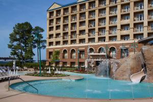 a hotel with a water slide in front of a building at Marriott Shoals Hotel & Spa in Florence