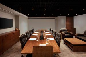a large conference room with a long table and chairs at Residence Inn by Marriott Istanbul Atasehir in Istanbul