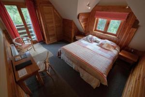 Postel nebo postele na pokoji v ubytování Petrohue Lodge