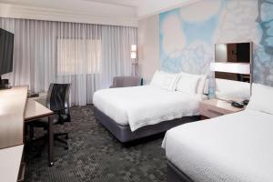 Ένα ή περισσότερα κρεβάτια σε δωμάτιο στο Courtyard by Marriott Pensacola