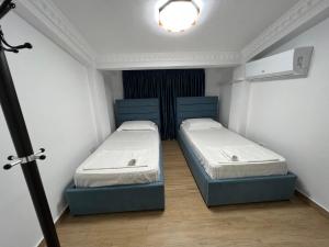 Postel nebo postele na pokoji v ubytování Apartment Elbasan city center 2