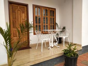Ban công/sân hiên tại Casa Maria Mystica apartments, Mananthavady, Wayanad