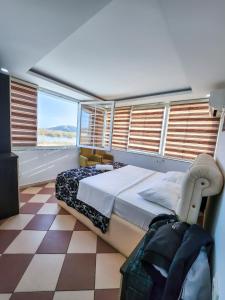 Кровать или кровати в номере Hotel Fantazia