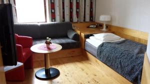 Postel nebo postele na pokoji v ubytování Hotell Toppen