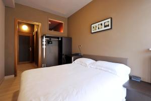 Postel nebo postele na pokoji v ubytování M14 Hotel & Spa
