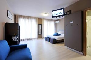 Postel nebo postele na pokoji v ubytování M14 Hotel & Spa