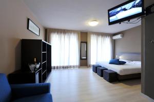 TV a/nebo společenská místnost v ubytování M14 Hotel & Spa