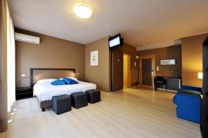 Postel nebo postele na pokoji v ubytování M14 Hotel & Spa