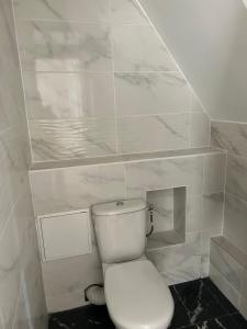 Kúpeľňa v ubytovaní F3 50m2 centre ville Massy + 11 fotografií