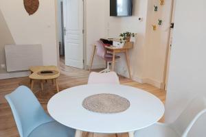 Posedenie v ubytovaní Appartement cozy au centre-ville