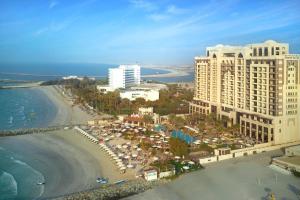 an aerial view of a resort and a beach at Ajman Saray, a Luxury Collection Resort, Ajman in Ajman 