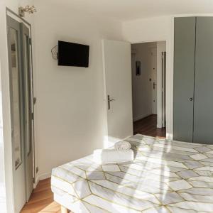 Posteľ alebo postele v izbe v ubytovaní Plage des catalans/vieux port