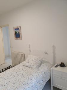 Postel nebo postele na pokoji v ubytování El piso de Valle-Inclán