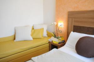 Voodi või voodid majutusasutuse Hotel I Due Cigni toas