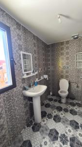 Ванная комната в LAFAMILIA SURF imsouane