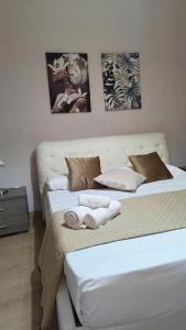 Postel nebo postele na pokoji v ubytování La Terrazza Di Athena sweet rooms