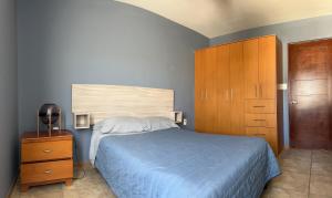Un pat sau paturi într-o cameră la Azul, Juriquilla Santa FE