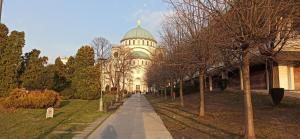 a building with a green dome on top of it at Belgrade St Sava Temple Hram in Belgrade