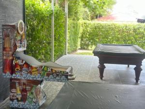 a pile of chips sitting next to a piano at Hermosa Casa de campo grande con aire acon,wifi,piscina,billar !villa ensueño ! in Carmen de Apicalá