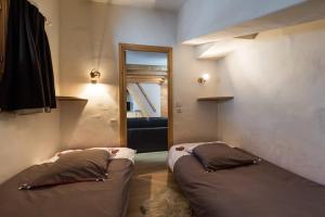 Posteľ alebo postele v izbe v ubytovaní Appartement 3 chambres au cœur de Courchevel 1850