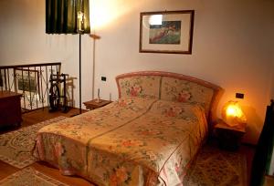 En eller flere senge i et værelse på B&B CASA MEDIEVALE DEL MUGNAIO (1300)