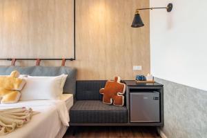 Postel nebo postele na pokoji v ubytování Bagan Suite