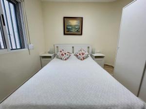 Posteľ alebo postele v izbe v ubytovaní Oliva Seaside Apartments