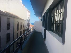 a view of an alley between two buildings at Deluxe La Palma 2 in Santa Cruz de la Palma